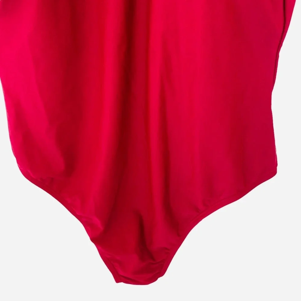 bebe | NWT size medium Burgandy low back one piece swimsuit with rhinestones